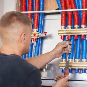 Plumber mounted distributor of central heating. Central Heating Distributor Plumber mounted distributor of central heating. Central Heating Distributor